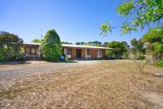 14 Spencer Road Ballan VIC 3342 $619,000 Now $599,000 The potential for this property is vast, sitting on 1 acre this double brick home offers: -3 decent sized bedrooms with BIR. -Main bedroom with ensuite, ceiling fan and WIR. -Carpeted living area with wood burner. -Functional kitchen with with ample cupboard space. -Dining area with sliding doors leading to garden. -Additional living/formal dining area - Bathroom -Tiled flooring in kitchen. -Timber lined throughout property. -Split system heating cooling. -13m x 6m shed with power and concrete floor. -This property is not connected to town gas or sewerage. This property has all the characteristics of a rural property but is only a short walk to the main st of Ballan and all that is on offer.