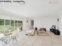 2448 Beaudesert Nerang Road Canungra QLD 4275 $1,775,000 2 Luxury homes situated on over 10 acres with approx 270m creek frontage! This is one of those properties that many people dream of and it could be yours... The acreage is fully usable, fertile and private with unlimited water supply from the creek and bore to service any of your hobbies you wish to pursue. Main residence, tastefully renovated: * 3 spacious bedrooms with an ensuite, including spa, off the master bedroom which opens up to the outdoor area. * Spacious kitchen overlooking the large open plan living and dining area with crisp/fresh decor opening up to the welcoming in ground pool. * Ducted air conditioning to cool and heat the home and a combustion heater and fans throughout. * Main bathroom located across from the 2 bedrooms with separate toilet, as well as a study large enough to be a 4th bedroom. * Double garage with remote controlled doors. The Cellar house: This is something spectacular, particularly for those that love to entertain. It is also overlooking the stunning pool and a recently built gazebo. It boasts a massive open plan area with teppanyaki kitchen that is an ideal area to have a game of billiards. It features a cosy open fire, ducted heating and cooling and separate bathroom, oh and to add to the sense of luxury there is also a sauna! Complete with another living and dining area, kitchen and a bedroom that would suit a king complete with ensuite and walk in robe, this is a beautiful home all on it's own. This is perfect for the extended family, young, old, or perhaps an extra income for holiday letting, being so close to town and all the activities the Scenic Rim has to offer. Internal stairs take you down to the enormous wine cellar, with walls lined with wine racks to hold your special collection and is complete with another kitchen. It's the perfect place to entertain with a difference. It has the feel of a high class restaurant at a vineyard. Outdoors: 12 x 6 m shed with power, awning and large avairy that could be converted to stables and separate paddock with equine fencing. Outlets around the property to supply water for irrigation to the established gardens, lawn/paddock and impressive palm trees. Picturesque dam full of turtles and an ideal area to sit back and take in nature and the stunning surrounding views. Or sit by the creek and enjoy the flowing water at your feet. The opportunities for this property are endless, particularly for our growing community and tourism. Only minutes to local cafes and speciality shops which thrive on the weekends. This property is certainly one that you must inspect to appreciate all it has to offer.
