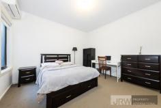 Unit 2/20 Yooralla St, Ashwood VIC 3147 Capturing the low-maintenance lifestyle dream with effortless style and space, this conveniently placed townhouse is perfect for families, couples and investors. Relishing a desired open plan ambience, the living and dining zone is overlooked by the beautifully equipped kitchen with pleasing privacy ledge, stainless steel appliances plus a dishwasher. Continuing to impress those chasing the fuss free dream, the rear deck spills out onto a synthetic turf courtyard where children can play, or families can entertain with friends. Accompanying the entry level living zones, you'll find one of the four robed bedrooms, ideal for guests or in-laws and serviced by a downstairs bathroom with toilet, while rising upstairs, the three remaining bedrooms all boast built-in-robes and share the second bathroom with toilet. Added benefits include a laundry, ducted heating, split system air conditioning plus a double garage with internal access. Situated in a prized location, close to PLC, Deakin Uni, Ashwood Secondary College, Parkhill Primary, Riversdale Golf Course, Jordanville Train Station, Woolworths, Chadstone Shopping Centre plus Monash Freeway.