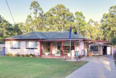 78 Ellalong Road Pelton NSW 2325 $370,000 - $380,000 CHERISHED FAMILY HOME, PEACEFUL RURAL OUTLOOK – One owner – in immaculate condition – Three double bedrooms, all with built-ins – Neat & tidy kitchen and bathroom, kitchen has plenty of storage – Ceiling fans & ducted air-conditioning throughout – Large double carport connects to a double garage, currently utilised as a family room. This area has direct access to an outdoor sheltered entertainment area and is a must see, perfect for teenagers/study/home office/wet weather room for kids – an endless list – Freestanding workshop & storage garage for the handyman – 1.5Kw solar system services the home – 809m2 block enjoys views from most rooms over Bushland – School bus at doorstep – 10 minutes to CBD – minutes from Ellalong & Bellbird Public Schools – One of the most immaculate properties I have offered at this age!
