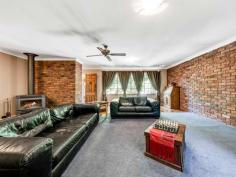 117 High Street Wallalong NSW 2320 $550,000 - $585,000 Set amongst a lush garden oasis brimming with hardy grasses and succulents, towering palms and manicured lawns, this large family home is one of a kind. Packed with charm and rustic ambience, the four-bedroom brick home combines a unique combination of warm country atmosphere with contemporary features. Framed by tall, established trees, the home is on a 1614sqm block with a quaint front porch, with pebblecrete flooring, creating a welcoming and cosy atmosphere in which to arrive at the property. Entry is directly into the spacious living area, which is brimming with country charm. Contemporary polished floorboards create a stunning first impression and combine beautifully with exposed brick feature walls and a slow combustion fire that’s ideal for chilly winter days spent warm and toasty indoors. The flooring merges to carpet in the sitting area of the living room and this offers both extra comfort and a modern edge to the decor, which marries beautifully with the natural light flooding in the large picture window. Soaring raked ceilings are a stunning feature of this home and they shine in the open-plan kitchen and dining room, where today’s appliances combine with slate-look flooring and timber cabinetry to create a practical yet eye-catching cooking and meals area. The kitchen has a 900mm, stainless steel Smeg oven, large pantry and lots of bench and cupboard space while French doors open off the dining area to the peaceful outdoor entertaining area. A natural pergola, exposed timber is covered with lush foliage to create a shady, cool entertaining area with a built-in barbeque. There is also an enclosed entertaining room with concrete flooring and access to a covered deck for entertaining and upstairs awaits a wonderful loft. Boasting timber floorboards and wall panelling, the loft has soaring raked ceilings and lots of natural light flooding in the series of large windows. The space is ideal for those that work from home or as a teenager’s retreat, with a split system air conditioner keeping the temperature perfect in every season. In the hot summer months you can also enjoy a dip in the inground pool, which is surrounded by lush gardens and is very private. Four generous bedrooms, all with built-in robes, await, with the master suite also boasting an ensuite and the other rooms sharing the family bathroom with its bath and separate, open shower with detachable shower head. Other features of this stunning property include a double garage with drive through access, a chicken coop and garden shed. All of this is just a 15-minute drive from all Maitland has to offer, including excellent schools, medical facilities and shopping. SMS 117High to 0428 166 755 for a link to the on-line property brochure. Kitchen Rumpus Room Built In Robes Verandah Floorboards High Ceilings Air Conditioning Dishwasher Pet Friendly Courtyard Outdoor Entertaining Area Fully Fenced In Ground Swimming Pool Electric Hot Water.