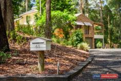 61 Symons Ave Boambee NSW 2450 $799,000 - $859,000 Once in a while you find a home that's surprisingly different & a pleasure to inspect. This sun-drenched corner of the Boambee Valley is the location of this uniquely designed, split level family home.The strategically planted gardens offer complete privacy from the street and neighbours, creating a relaxing environment to come home to.Stepping inside you find a home full of light with a serene green outlook from every window.Set on just under 2 acres, you will find the maintenance is surprisingly low, as most of the land has been left in its natural bush/rainforest state.A level grassed area around the home is perfect for kids to play & there is plenty of space for a pool just off the living & undercover entertainment area.The updated kitchen is central to two living and two dining areas.Each living space is heated by a slow combustion fireplace - creating a cosy ambience in the cooler months.An extra powder room is a handy addition for the busy family, as is the study nook off the main family room area.The master bedroom suite is situated in the loft away from the rest of the home, and has it's own study/retreat, or possibly a nursery attached.A possible 5th bedroom could be easily created by converting the formal dining room. Professional people, young families and couples alike would all appreciate the serenity & space this property offers.Situated in a quiet cul-de-sac within a short drive to local shops, schools & beaches.Conveniently less than 10 mins to Airport, Sawtell beachside lifestyle & the Coffs Harbour CBD.