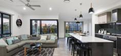 15 Milby St YARRABILBA QLD 4207 $499,000 + Enjoy all the comfort and luxury of this fabulous North facing modern home. This property is situated in the one of the newest parts of Yarrabilba & is surrounded by other equally fabulous homes. With an elevated position this home also enjoys panoramic views of the mountains afar, quiet, private with everything you could ask for in an exclusive address. Upstairs features four large bedrooms with the master bedroom complete with superb ensuite with extra large shower, double hand basins and walk in robe. The large upstairs Rumpus area is perfect for a kids play area, while offering full privacy from guests as all sleeping quarters are located upstairs. Downstairs features a large well equipped kitchen with the very best of everything including 6 burner gas range, genuine stone bench tops, dishwasher and walk in pantry. With plenty of cupboards storage space is not a problem in this gorgeous kitchen. The chef in the family is going to love cooking up a feast when entertaining yet the large open plan layout also means the chef still gets to join in the fun. Directly off the kitchen is the large covered alfresco area providing all year round dining, BBQ parties or to simply enjoy informal family meals. Downstairs also includes formal and informal lounge, study and third toilet with powder room. Things you will love - 4 Bedrooms + Study / all bedrooms inc built in robes - 2.5 Bathrooms - Ducted Air Conditioning - Gas Cooking - Stone Bench Tops - Walk In Pantry - Seperate Laundry - Master Bedroom with His & Hers Walk In Robe - 4 Living areas - 3yrs Old - 732 Block Size - 289 House Size - Corner Block with Full Side Access