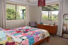 1A Ward Street Lawrence NSW 2460 $368,000 The beautiful Clarence River village of Lawrence is perfectly situated between the Jacaranda City if Grafton and the historic town of Maclean. This ideal location provides workers with options for a leisurely commute in either direction and a waterfront playground to come home to. This special property is located in a desirable flood free area with very pleasant rural views and convenient proximity to town facilities. The very neat and spacious home offer: Separate internal living areas - Generous sized bedrooms with ceiling fans - Decent sized kitchen with casual dining off an island bench - Large bathroom with a shower, bath, vanity and separate toilet plus there is a second toilet in the laundry - Year-round comfort is assured with a Wood heater, R/C/air-conditioner & ceiling fans - Polished timber floors - Fresh neutral paint colours and large windows throughout - Covered access to the home from the double carport - Full length covered verandah and decks that take in those forever changing rural views. Other features of the property include a garden storage shed with separate wood shed, 918m2 block with plenty of open yard space, vegetable garden beds and beautiful established gardens with a wide variety of mature plants trees and shrubs that just complete this perfect package.