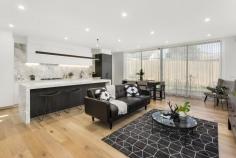 3/39 Caroline Street Aberfeldie VIC 3040 $1,290,000 An enviable position within the prestigious Maribyrnong River precinct sets the scene for family luxury at this brand new four bedroom, three bathroom executive residence. Servicing a vast open living domain with entertaining deck is a kitchen designed for the culinary enthusiast. Waterfall stone counters highlight 900mm appliances, dishwasher by Smeg, integrated Fisher & Paykel refrigeration and stone splashback. Four double robed bedrooms access three deluxe fully tiled bathrooms, main with freestanding bath. All feature a split system air conditioner for personalised comfort. Confirming ultimate convenience, both floors present a radiant master boasting WIR/ensuite. Outstanding extras include a quiet study alcove, video intercom, security alarm, double glazed windows, powder room (fourth toilet), stone bench tops throughout, even in a storage packed laundry and a remote controlled garage with internal access.