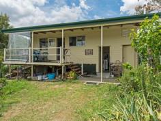 127-137 Larch Road Tamborine QLD 4270 $550,000 Tucked away in Tamborine you will find this property sitting on 9.9 acres of beautiful land. There are several options on offer with this property with others in the street recently selling in the high $700,000's. Current infrastructure includes a compact 3 bed house with 3 toilets, 2 showers, ceiling fans and fireplace. 2 x dams, solar hot water, bore (no power and will need a new pump), 1 x demountable storage with no power, huge 4 bay undercover parking for machinery, several shade houses / nursery's for the green thumb. Fruit trees including some delicious dragon fruit. Why not live in the existing house while you build your dream home? Then renovate the old home as an additional dwelling? OR demolish all existing infrastructure and create the property of your dreams? OR simply renovate the existing home. Properties like these don't come up often - the Seller is motivated and prepared to meet the market this will sell quick!
