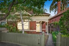 10 Grace Street Malvern VIC 3144 Enjoying a tranquil setting in a tree lined street, this charming solid brick Edwardian residence located in a coveted position in Malvern boasts generously proportioned interiors flooded with natural light. Beyond a traditional façade and beautifully landscaped gardens, this captivating home retains many trademark period features including high decorative ceilings, coloured leadlight, timber fretwork and polished hardwood floors. An L shaped hallway flows past a spacious living room, three bedrooms, all with built in robes, and a bright family bathroom. At the rear, a functional kitchen equipped with Miele dishwasher, gas cooktop and ample storage offers a casual meals counter and opens out to a private north east facing courtyard, perfect for relaxing in the morning sun. Includes dedicated laundry and ducted heating. Perfectly positioned in close proximity to Glenferrie Road and High Street shops and cafes, Malvern Public Gardens, Malvern Central, Harold Holt Swim Centre, transport and excellent schools.