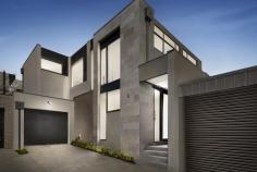 3/39 Caroline Street Aberfeldie VIC 3040 $1,290,000 An enviable position within the prestigious Maribyrnong River precinct sets the scene for family luxury at this brand new four bedroom, three bathroom executive residence. Servicing a vast open living domain with entertaining deck is a kitchen designed for the culinary enthusiast. Waterfall stone counters highlight 900mm appliances, dishwasher by Smeg, integrated Fisher & Paykel refrigeration and stone splashback. Four double robed bedrooms access three deluxe fully tiled bathrooms, main with freestanding bath. All feature a split system air conditioner for personalised comfort. Confirming ultimate convenience, both floors present a radiant master boasting WIR/ensuite. Outstanding extras include a quiet study alcove, video intercom, security alarm, double glazed windows, powder room (fourth toilet), stone bench tops throughout, even in a storage packed laundry and a remote controlled garage with internal access.