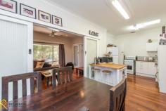 30 Geneff Street Innaloo WA 6018 $785,000 Offering a life of ultimate convenience this solid brick and tile home on a level 733m2 (approx.) block is perfectly positioned on a quiet, tree-lined street. With its prime central location you are situated only moments away from a host of desirable places including local parks, public transport, Westfield Innaloo, cinemas, restaurants, health and fitness facilities, excellent schools and easy access to Mitchell Freeway. With a true cosmopolitan lifestyle beckoning the minute you walk out the door you will be spoilt for choice, yet when at home enjoying your own private sanctuary. Upon entry you are greeted by the cosy living area with leafy outlook onto the front gardens. Walk through to the open plan dining and kitchen featuring high ceilings, white cabinetry and wooden benchtop. The additional room to the rear of the home is the perfect second lounge area or play room for the young ones. Large timber glass doors maximise the amount of light coming into the home and open onto a HUGE entertainment patio with enough space for dining setting, daybed, ping-pong table and more. With an Eastern orientation to the rear of the property and enough grass for a game of backyard cricket this area presents itself as the ideal space to share a drink with family and friends. Inside you will find appealing original features including jarrah floorboards and 4 bedrooms that are all serviced by the well-appointed bathroom. Completing the home is an internal laundry with separate water closet and secure single car garage with drive through parking to a rear workshop. Much of the hard work has been done to convert this into a super-comfortable family home and offers unparalleled opportunity to a savvy buyer. Move straight in and enjoy the home for years to come or demolish the existing dwelling and realise the value of multi-level dwelling apartments. With Innaloo about to be transformed into a revitalised and vibrant community hub this suburb will soon be the place that people want to live. Key Features: 733m2 level block with 19.5m frontage (approx.) Zoned for multi-level dwelling apartments 4 bedroom, 1 bathroom Two separate living areas Solid brick and tile home Huge rear entertainment patio with Eastern orientation and grassed yard Secure, single garage with drive through access to workshop.
