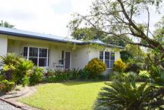 44 Thomas Court Bulgun QLD 4854 $480,000 This home in a rural like setting amongst other small acreages wold ideally suit a family. There are 5 bedrooms, a huge 72,000 litre pool, double garaging and a huge pool side under cover outdoor patio/living area plus an extra 5000 x 10000 under cover space. It appears to be very solidly built out of cement block with no expense spared. The kitchen is spectacular and recently installed and there is a roomy sunken lounge. There are split air-cons all throughout, bay windows and a circular drive way. The colourbond roof is only a few years old. (Undoubtedly this huge quality home would cost several hundreds of thousands of dollars to build today, given the quality and materials used). The property backs on to Wunga Creek and is fully fenced. It is located at Bulgun, a semi rural neighbourhood only 20 mins. from Mission Beach with lush tropical islands and the Great Barrier Reef off shore. Highly Recommended to View this Realistically Priced Gem! FEATURES: Air Conditioning Built-In Wardrobes Garden Pool Secure Parking Terrace/Balcony