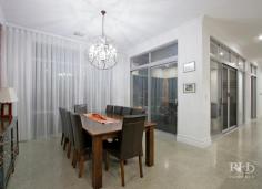 5C KISHORN ROAD Applecross WA 6153 $1,999,000 Register your interest today in this amazing home. Beautifully presented and as-new. This modern home makes no compromises with high-end designer interiors meeting elegant alfresco living on a superbly manicured 704sqm green-titled block with in-ground pool. The spacious single-level floor plan also offers plenty of space, for family living, and you’ll love this convenient family-friendly location that’s opposite Applecross Primary School parklands, and just moments to Ardross Street cafes and shops. -- Living/dining area with polished concrete floor, modern chandelier and stylish feature wall -- High-end designer kitchen with stone bench tops, sleek cabinetry and premium appliances -- Generous home office or additional living space off the main living/dining area -- Carpeted, king-sized master bedroom with large walk-in robe through to luxury ensuite -- Three large additional bedrooms plus an extra sitting room provides even more living space -- Stunning main bathroom with twin vanity, bath, shower and private alfresco terrace -- Large integrated entertainer’s patio features high-end alfresco kitchenette with fridge -- Secure, manicured grounds plus a sparkling in-ground pool with frameless glass fence -- Well-equipped internal laundry with plentiful cabinetry and powder room with vanity -- Gated front access to private front yard with large lock-up garage and solar power system Secure gate entry ensures your privacy as you enter into the fully fenced front yard that features manicured lawns and a sparkling in-ground pool with frameless glass fence. Continue inside where the stylish open-plan living/dining area will impress with premium on-trend styling including polished concrete flooring, a raw brick feature wall, distinctive contemporary light fittings, an over-sized Plantation-style ceiling fan and a stunning atrium-style ceiling recess to the living area. The immaculate high-end kitchen will fulfil every home chef’s wildest dreams, and entertaining is a real treat on the large integrated patio with alfresco kitchenette. The king-sized master bedroom is another standout feature of the home with a large walk-in robe and luxury designer ensuite that features a striking freestanding bath, twin vanities, floor-to-ceiling tiles and a large open rain-head shower behind a stunning raw brick partition. An additional sitting room and a generous home office provide even more living space, and the large second, third and fourth bedrooms – all with built-in robes – share the quality family-sized main bathroom to complete this impressive package. For more info, call Frank Sanchez on 0419 367 999 or Mike Quirici on 0402 085 533. DISCLAIMER: Whilst every care has been taken with the preparation of the particulars contained in the information supplied, believed to be correct, neither the Agent nor the client nor servants of both, guarantee their accuracy. Interested persons are advised to make their own enquiries and satisfy themselves in all respects. The particulars contained are not intended to form part of any contract.