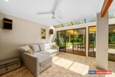 61 Symons Ave Boambee NSW 2450 $799,000 - $859,000 Once in a while you find a home that's surprisingly different & a pleasure to inspect. This sun-drenched corner of the Boambee Valley is the location of this uniquely designed, split level family home.The strategically planted gardens offer complete privacy from the street and neighbours, creating a relaxing environment to come home to.Stepping inside you find a home full of light with a serene green outlook from every window.Set on just under 2 acres, you will find the maintenance is surprisingly low, as most of the land has been left in its natural bush/rainforest state.A level grassed area around the home is perfect for kids to play & there is plenty of space for a pool just off the living & undercover entertainment area.The updated kitchen is central to two living and two dining areas.Each living space is heated by a slow combustion fireplace - creating a cosy ambience in the cooler months.An extra powder room is a handy addition for the busy family, as is the study nook off the main family room area.The master bedroom suite is situated in the loft away from the rest of the home, and has it's own study/retreat, or possibly a nursery attached.A possible 5th bedroom could be easily created by converting the formal dining room. Professional people, young families and couples alike would all appreciate the serenity & space this property offers.Situated in a quiet cul-de-sac within a short drive to local shops, schools & beaches.Conveniently less than 10 mins to Airport, Sawtell beachside lifestyle & the Coffs Harbour CBD.