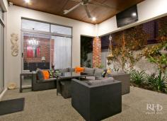5C KISHORN ROAD Applecross WA 6153 $1,999,000 Register your interest today in this amazing home. Beautifully presented and as-new. This modern home makes no compromises with high-end designer interiors meeting elegant alfresco living on a superbly manicured 704sqm green-titled block with in-ground pool. The spacious single-level floor plan also offers plenty of space, for family living, and you’ll love this convenient family-friendly location that’s opposite Applecross Primary School parklands, and just moments to Ardross Street cafes and shops. -- Living/dining area with polished concrete floor, modern chandelier and stylish feature wall -- High-end designer kitchen with stone bench tops, sleek cabinetry and premium appliances -- Generous home office or additional living space off the main living/dining area -- Carpeted, king-sized master bedroom with large walk-in robe through to luxury ensuite -- Three large additional bedrooms plus an extra sitting room provides even more living space -- Stunning main bathroom with twin vanity, bath, shower and private alfresco terrace -- Large integrated entertainer’s patio features high-end alfresco kitchenette with fridge -- Secure, manicured grounds plus a sparkling in-ground pool with frameless glass fence -- Well-equipped internal laundry with plentiful cabinetry and powder room with vanity -- Gated front access to private front yard with large lock-up garage and solar power system Secure gate entry ensures your privacy as you enter into the fully fenced front yard that features manicured lawns and a sparkling in-ground pool with frameless glass fence. Continue inside where the stylish open-plan living/dining area will impress with premium on-trend styling including polished concrete flooring, a raw brick feature wall, distinctive contemporary light fittings, an over-sized Plantation-style ceiling fan and a stunning atrium-style ceiling recess to the living area. The immaculate high-end kitchen will fulfil every home chef’s wildest dreams, and entertaining is a real treat on the large integrated patio with alfresco kitchenette. The king-sized master bedroom is another standout feature of the home with a large walk-in robe and luxury designer ensuite that features a striking freestanding bath, twin vanities, floor-to-ceiling tiles and a large open rain-head shower behind a stunning raw brick partition. An additional sitting room and a generous home office provide even more living space, and the large second, third and fourth bedrooms – all with built-in robes – share the quality family-sized main bathroom to complete this impressive package. For more info, call Frank Sanchez on 0419 367 999 or Mike Quirici on 0402 085 533. DISCLAIMER: Whilst every care has been taken with the preparation of the particulars contained in the information supplied, believed to be correct, neither the Agent nor the client nor servants of both, guarantee their accuracy. Interested persons are advised to make their own enquiries and satisfy themselves in all respects. The particulars contained are not intended to form part of any contract.