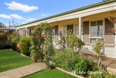 14 Curia Street Mansfield VIC 3722 $445,000 Wander to the shops from this easy-maintenance home, ideal for investors or downsizers, in a central Curia Street location – walking distance to everything! * Charming & immaculately presented home on a large 621m2 allotment * Securely fenced, with lovely undercover front and rear verandahs * Beautiful garden setting – roses, natives, perennials, all well established * Comfortable open plan living/dining and kitchen with gas heater & A/C * Natural light fills the 3 good sized bedrooms, master offering BIR’s * Central bathroom with bathtub, laundry plus additional separate W/C * Secure rear yard featuring lock-up garage with concrete floor & power * Additional garden storage, plus plenty of space to potter around or play! * A rare opportunity – much loved by the current owners for over 20 years.
