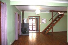 21 Elizabeth Ave, Uralla NSW 2358 $460,000 Situated on approximately 6070m², this classic three bedroom weatherboard home is just 500 metres from the main shopping area. The land is a mixture of cottage gardens, maintained creek land open lawns. The house was fully renovated in recent years and features polished floors and French doors leading out to sunny decks and an in-deck swimming pool. The main bedroom adjoins a dressing room (or office) while the third bedroom is situated in the large attic. The open plan living and dining area includes a slow combustion wood heater. The modern kitchen includes an electric and wood stove as well a washing machine. The home is fully insulated. Other improvements include a studio with access to Maitland Street, a carport with storage area and a tree house. The gardens are home to various relaxing sitting areas and a stone creek crossing to the studio.