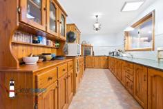 10 gibboketon Pl Wallaga Lake NSW 2546 $639,000 "Asmara" - Situated on a generous 4581 m2 block of land backing onto bushland, this single level three bedroom, two bathroom home has a lot to offer and is only a short walk to the lake and beach. Features: Open plan design with slow combustion wood heater, large master bedroom with ensuite, two additional good sized bedrooms, bathroom, rustic kitchen and a huge sunroom at the rear. From the sunroom, you enter a fenced area which is ideal for family pets. The covered alfresco barbecue area is up a couple of steps and next to a single garage. The front yard is level with nice grass areas and minimal gardens. Garages: At the rear of the property is a 12m x 12m American Style Barn with three roller doors. The centre door is high and ideal for boat storage. The large single garage next to the house has plenty of workshop space and the other single garage near the barbecue area is ideal for storing items for your family gatherings. Location: This quiet, friendly neighbourhood backs onto bushland and is within an easy walk to Haywards's Beach, Wallaga Lake and many good fishing spots. The beach has a large section that is dog friendly. A short drive into Bermagui and even more pristine beaches, ten minutes to Central Tilba with its many specialty shops and cheese factory. Rent Back: The vendor is downsizing and would like to rent back for a few months or discuss renting the large shed at the rear to allow him time to move into his new property.