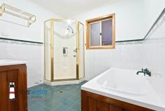 10 gibboketon Pl Wallaga Lake NSW 2546 $639,000 "Asmara" - Situated on a generous 4581 m2 block of land backing onto bushland, this single level three bedroom, two bathroom home has a lot to offer and is only a short walk to the lake and beach. Features: Open plan design with slow combustion wood heater, large master bedroom with ensuite, two additional good sized bedrooms, bathroom, rustic kitchen and a huge sunroom at the rear. From the sunroom, you enter a fenced area which is ideal for family pets. The covered alfresco barbecue area is up a couple of steps and next to a single garage. The front yard is level with nice grass areas and minimal gardens. Garages: At the rear of the property is a 12m x 12m American Style Barn with three roller doors. The centre door is high and ideal for boat storage. The large single garage next to the house has plenty of workshop space and the other single garage near the barbecue area is ideal for storing items for your family gatherings. Location: This quiet, friendly neighbourhood backs onto bushland and is within an easy walk to Haywards's Beach, Wallaga Lake and many good fishing spots. The beach has a large section that is dog friendly. A short drive into Bermagui and even more pristine beaches, ten minutes to Central Tilba with its many specialty shops and cheese factory. Rent Back: The vendor is downsizing and would like to rent back for a few months or discuss renting the large shed at the rear to allow him time to move into his new property.