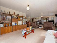 1 Laurel Street Gooburrum QLD 4670 $269,000 If space is on the agenda, this residential home in a rural community is the perfect arrangement to live in comfort and have the feel of open space. 1 Laurel Street, Gooburrum will accomodate the largest of family’s and will be the happy place of many memories to come. Positioned just 8km to Bundaberg CBD, 16km to Moore Park Beach, a beautifully positioned home, which soaks up all the surrounding rural aspect. Consists of four very good size bedrooms, a huge living area with sitting room on entry. There is a large built-in bar combined with the dining, which flows into the kitchen. The bathroom has been recently renovated, designed wheel-chair friendly. The large covered outdoor entertaining area captures beautiful breezes, a nice place to entertain whilst the kids splash in the above ground swimming pool, and you can wash off under the freshwater shower. The fenced 905sqm block is nicely landscaped, all gardens & the front yard equipped with sprinklers to retain a fresh surround. Water will never be a problem, as you have access to an unmetered domestic bore, connected to the residence. A large double lock up garage is attached, which includes a huge workshop space, as well as a double carport off the front. 1 Laurel Street, Gooburrum feature’s:- – Four very generous size bedrooms – Huge lounge room which can be split into two spaces – Built-in bar, dishwasher & pantry in the kitchen – Home is designed wheelchair friendly – Security screens throughout – Air-conditioning to the main living & master bedroom – 2kw solar power system – Remote access to the garage – Above-ground swimming pool with outdoor shower – Garden shed – Treated bore water connected to the home, as well as rain water tank – 905sqm fenced block, garden & yard sprinkler irrigation – 2 toilets – Gooburrum Primary & Bundaberg North school catchment area – 16km to Moore Park Beach, 8km to Bundaberg CBD