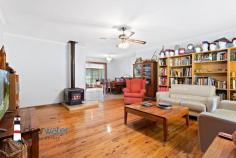 10 gibboketon Pl Wallaga Lake NSW 2546 $639,000 "Asmara" - Situated on a generous 4581 m2 block of land backing onto bushland, this single level three bedroom, two bathroom home has a lot to offer and is only a short walk to the lake and beach. Features: Open plan design with slow combustion wood heater, large master bedroom with ensuite, two additional good sized bedrooms, bathroom, rustic kitchen and a huge sunroom at the rear. From the sunroom, you enter a fenced area which is ideal for family pets. The covered alfresco barbecue area is up a couple of steps and next to a single garage. The front yard is level with nice grass areas and minimal gardens. Garages: At the rear of the property is a 12m x 12m American Style Barn with three roller doors. The centre door is high and ideal for boat storage. The large single garage next to the house has plenty of workshop space and the other single garage near the barbecue area is ideal for storing items for your family gatherings. Location: This quiet, friendly neighbourhood backs onto bushland and is within an easy walk to Haywards's Beach, Wallaga Lake and many good fishing spots. The beach has a large section that is dog friendly. A short drive into Bermagui and even more pristine beaches, ten minutes to Central Tilba with its many specialty shops and cheese factory. Rent Back: The vendor is downsizing and would like to rent back for a few months or discuss renting the large shed at the rear to allow him time to move into his new property.