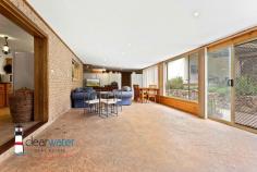 10 gibboketon Pl Wallaga Lake NSW 2546 $639,000 "Asmara" - Situated on a generous 4581 m2 block of land backing onto bushland, this single level three bedroom, two bathroom home has a lot to offer and is only a short walk to the lake and beach. Features: Open plan design with slow combustion wood heater, large master bedroom with ensuite, two additional good sized bedrooms, bathroom, rustic kitchen and a huge sunroom at the rear. From the sunroom, you enter a fenced area which is ideal for family pets. The covered alfresco barbecue area is up a couple of steps and next to a single garage. The front yard is level with nice grass areas and minimal gardens. Garages: At the rear of the property is a 12m x 12m American Style Barn with three roller doors. The centre door is high and ideal for boat storage. The large single garage next to the house has plenty of workshop space and the other single garage near the barbecue area is ideal for storing items for your family gatherings. Location: This quiet, friendly neighbourhood backs onto bushland and is within an easy walk to Haywards's Beach, Wallaga Lake and many good fishing spots. The beach has a large section that is dog friendly. A short drive into Bermagui and even more pristine beaches, ten minutes to Central Tilba with its many specialty shops and cheese factory. Rent Back: The vendor is downsizing and would like to rent back for a few months or discuss renting the large shed at the rear to allow him time to move into his new property.