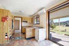 19 Hawdon St Moruya NSW 2537 $430,000 "Shayna" - A functional four bedroom, one bathroom (with space for a 2nd) brick and tile home with solar walking distance to Moruya Hospital, Moruya Bowling Club, Moruya CBD and the Moruya river. This home would be ideal for families, investors or someone who wants a single level home on an easy care block of land with mountain views. Featuring: Open plan lounge and dining, a slow combustion wood heater, air conditioning and a large covered veranda ideal for alfresco entertaining with views to the distant mountains. Currently, the single garage has been converted to a rumpus room but it could easily be changed back. There is a single carport at the side of the home. Location: Close to amenities, fishing, boating and Moruya Hospital.
