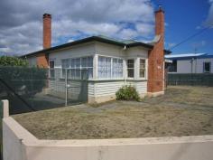 168 William Street Devonport TAS 7310 $245,000 Comprising of a solid 3 bedroom weatherboard home (approx. 124 M2) on an 888 M2 corner block. The property is fully fenced with a lockable garage, powered workshop/storage plus ample access to park the trailer, boat, caravan or RV. Spacious bedrooms, high ceilings, ample cupboard storage in the passage, solid Tas.Oak flooring throughout, sizable kitchen/dining and living area along with enclosed front and rear porches. The master bedroom with a built in robe, serviceable bathroom and laundry plus a light and airy sun room that may be used as another bedroom/office or play area for young children. The positioning of the home gathers sun rays from early morning till late afternoon, while cooler times an open fireplace is used. This property is sound and sturdy, needing some TLC, for those wishing to place their own mark to it. This property is within walking distances of the Fourways shopping, three large supermarkets and the Devonport City centre. Don College, high/primary and private Schools are also close by. This property may suit a first home purchaser, investor, builder or developer.