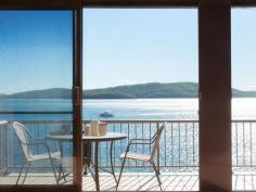 2/107 Soldiers Point Road Soldiers Point NSW 2317 $690,000 A family holiday is a much anticipated event that builds memories to last a lifetime, this water front townhouse at Kangaroo Point Reserve more than sets the perfect scene. You'd be nuts not to want to live here or use it as your holiday home as it is bright and airy, well maintained and presented. The design is creative with cathedral ceilings to the upper level exuding the feeling of space and light to the open plan living and dining that leads to the spacious balcony, whilst the kitchen is modern with plenty of space. On the lower floor is another living area that leads to the courtyard and water's edge. There's two generous bedrooms and laundry/bathroom. Covered parking for two cars gives easy access via direct entry to the foyer. Comes fully furnished if desired as well. This is a position perfect property situated within walking distance to numerous Bay beaches with their gentle waters action plus surf beaches just 10 minutes drive away. Soldiers Point boat ramp is just up the road as is another at Salamander Shores. A short hike of 450 metres and you are at Soldiers Point Bowling Club or just about the same to Bannisters Port Stephens, with more cafes and restaurants either West or South that are also very close by. Here's your chance to directly view the sparkling waters of Port Stephens and not have to look over rooves, it's a stunning view and the property is of generous size so come and secure it today, before this one slips through your fingers. Disclaimer:- Whist all care has been taken preparing this advertisement and the information contained herein has been obtained from sources we believe to be reliable, PRDnationwide does not warrant, represent or guarantee the accuracy, adequacy, or completeness of the information. PRDnationwide accepts no liability for any loss or damage (whether caused by negligence or not) resulting from reliance on this information, and potential purchasers should make their own investigations before purchasing.