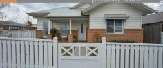 6 Langley Ave Renwick NSW 2575 INTRODUCING A CAPTIVATING SANCTUARY OF LIGHT AND SPACE CHARMINGLY DECORATED AND IMMACULATELY PRESENTED IT HAS IMMEDIATE STREET APPEAL AND OFFERS RELAXED, COMFORTABLE LIVING * Wide, tiled entry from front verandah * Open plan, tiled living and dining areas with French doors to outdoor entertaining area * 3 double bedrooms - plantation shutters in bedroom 1 * Built-in robes (WIR in main) * 2 bathrooms (ensuite to main) * Formal lounge/study (off entry) with sliding doors to garden (could be 4th bedroom) * Superb kitchen with Omega electric oven + 5 burner gas cooktop, stainless steel flue, dishwasher, walk-in pantry, Caesarstone benchtops and an abundance of cupboards * 9ft ceilings * Split-system air conditioning * Gas points * Town water + 5000ltr water tank for garden * Security alarm system * Laundry with door to outside * Double garage with auto door and internal access