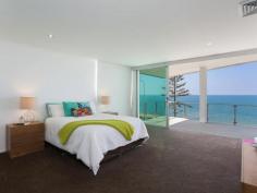 115 Margate Pde, Margate - Waterfront Properties Redcliffe ULTIMATE IN LUXURY LIVING This luxurious masterpiece will impress from start to finish. Boasting the perfect location, this architecturally designed and built home offers outstanding vistas and a waterfront lifestyle second to none. Properties of this calibre and location are rarely offered to the market. Move in and enjoy being surrounded by the absolute quality this immaculate residence offers…… not to mention waking to the sound of waves rolling gently onto the foreshore, sunrise peeping over the horizon and the moon shimmering across the bay at the close of play …….. just amazing. The user-friendly design features high ceilings and spacious light filled rooms with a floor plan that spans 3 levels of designer brilliance, this home ticks every box. Providing the ultimate in executive entertainment with a full wet bar and pool room flowing onto the extensive deck, where you will spend hours enjoying the endless views across the bay or alternatively, move to the sanctuary of the media room to choose from a full range of entertainment options. The huge feature packed gourmet kitchen leaves nothing to be desired. Including a massive island bench ideally positioned to take in the glorious bay views. Miele appliances including dishwasher, 900mm induction cook top, steam oven, plate warmer and microwave with an abundance of storage. The third level master bedroom epitomises luxury with extensive bay vista pouring into the room, massive open area ensuite and WIR. A further three double sized bedrooms, all with large WIRs, a second ensuite, main 2 way bathroom/ensuite and powder room provides for all the family and guests with ease. Massive 674sqm of luxuriously appointed living Additional Features: - Huge home office - The basement level has space for all the toys, including up to 8 car spaces with large storage room, second laundry and powder room. - Very Low maintenance, fully landscaped block with a 23,000 litre inground, concrete water tank. - Ducted air throughout - Polished timber staircases - Huge well appointed laundry - Vacuum maid - Intercom - Security alarm system - Water and power to all balconies - Efficient Heat pump hot water system - Provision, plans and approval for lift and pool. From this gorgeous home, stroll in either direction for kilometres without leaving the sandy shores of the bay. Perched on arguably the premium strip of beach on the Peninsula, this home is simply …….the ultimate in luxury waterfront living. Property Code: 590