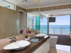 115 Margate Pde, Margate - Waterfront Properties Redcliffe ULTIMATE IN LUXURY LIVING This luxurious masterpiece will impress from start to finish. Boasting the perfect location, this architecturally designed and built home offers outstanding vistas and a waterfront lifestyle second to none. Properties of this calibre and location are rarely offered to the market. Move in and enjoy being surrounded by the absolute quality this immaculate residence offers…… not to mention waking to the sound of waves rolling gently onto the foreshore, sunrise peeping over the horizon and the moon shimmering across the bay at the close of play …….. just amazing. The user-friendly design features high ceilings and spacious light filled rooms with a floor plan that spans 3 levels of designer brilliance, this home ticks every box. Providing the ultimate in executive entertainment with a full wet bar and pool room flowing onto the extensive deck, where you will spend hours enjoying the endless views across the bay or alternatively, move to the sanctuary of the media room to choose from a full range of entertainment options. The huge feature packed gourmet kitchen leaves nothing to be desired. Including a massive island bench ideally positioned to take in the glorious bay views. Miele appliances including dishwasher, 900mm induction cook top, steam oven, plate warmer and microwave with an abundance of storage. The third level master bedroom epitomises luxury with extensive bay vista pouring into the room, massive open area ensuite and WIR. A further three double sized bedrooms, all with large WIRs, a second ensuite, main 2 way bathroom/ensuite and powder room provides for all the family and guests with ease. Massive 674sqm of luxuriously appointed living Additional Features: - Huge home office - The basement level has space for all the toys, including up to 8 car spaces with large storage room, second laundry and powder room. - Very Low maintenance, fully landscaped block with a 23,000 litre inground, concrete water tank. - Ducted air throughout - Polished timber staircases - Huge well appointed laundry - Vacuum maid - Intercom - Security alarm system - Water and power to all balconies - Efficient Heat pump hot water system - Provision, plans and approval for lift and pool. From this gorgeous home, stroll in either direction for kilometres without leaving the sandy shores of the bay. Perched on arguably the premium strip of beach on the Peninsula, this home is simply …….the ultimate in luxury waterfront living. Property Code: 590