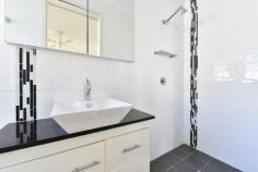 351 Old Pacific Highway Swansea NSW 2281 $550,000-$600,000 Smartly updated throughout, this flawlessly presented brick-built home enjoys the luxuries of abundant natural light and an uplifting sense of tranquility. New carpet and just painted interiors are fresh, bright and welcoming, with dual living zones, a stunning Caesarstone kitchen and large picture windows – the front framing lush bush views. Four bedrooms and two bathrooms provide total family comfort while the addition of sustainable bamboo flooring, split-system air-conditioning and a double garage add value. Step outside to a bush track that leads you directly to the pristine waters’ of Margaret’s Bay while enjoying easy access to the A43 for a quick 5-minute drive the heart of Swansea. – Beautifully updated home finished with crisp tones and modern flourishes – Front and rear living areas provide the perfect template for family life – CaesarStone kitchen with glass splashback and stainless steel appliances – A fantastic alfresco entertaining area extends to a grassy, landscaped yard – All bedrooms are large, appointed with built-in robes and brand new carpet – Master ensuite plus family bathroom with shower, bathtub and separate wc – Split-system a/c and ceiling fans; extensive down-lighting features throughout – Automated double garage plus space to park boats, trailers or campervans – Lifestyle location with the neighbouring lake, beaches and bush ready to explore – Minutes to quality schools, retail stores, supermarkets and dining options