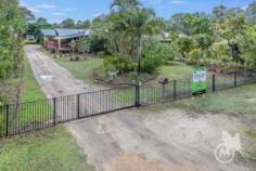176 White Patch Esplanade, WHITE PATCH QLD 4507 | Madeleine Hicks Real Estate Brisbane There are only a limited number of waterfront properties and your acreage beach hideaway is hidden amongst the gum trees, only two doors from the Bribie Island Recreational Park. The environment is not only special but unique and here you will find your charming Polynesian Style home. Character, soaring ceilings, polished floors, wide deck a truly idyllic property located in a natural Australian bush environment with the sparkling sun kissed Pumicestone Passage at your front door. With 2023 square meters fully fenced lot, it is perfect for children and pets to enjoy. There is plenty of room for “toys” in the 3 huge sheds plus bonus plumbed-in shed with kitchen facilities. Life on the esplanade is tranquil with visits from the local kangaroo and wallaby families, occasional brumby and other local wildlife. It is a pleasure to sit on the deck and gaze over at the shimmering passage while only a few minutes’ drive to Banksia Beach Shopping Centre, Banksia Beach Primary School, Pacific Harbour Golf and Country Club, Solander Lake Bowls Club and much more. You will LOVE: – Potential for granny flat – 2 bedrooms plus office or nursery – Ensuite – Solar 3kw – Fire place – 4 car accommodation – Open plan living – Side access – Light filled living – Huge SHED Ask Madeleine and Kerry today to make this hidden gem yours before someone else does. Land: 2023 m² Bedrooms: 2 Bathrooms: 2