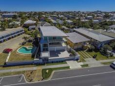 115 Margate Pde, Margate - Waterfront Properties Redcliffe ULTIMATE IN LUXURY LIVING This luxurious masterpiece will impress from start to finish. Boasting the perfect location, this architecturally designed and built home offers outstanding vistas and a waterfront lifestyle second to none. Properties of this calibre and location are rarely offered to the market. Move in and enjoy being surrounded by the absolute quality this immaculate residence offers…… not to mention waking to the sound of waves rolling gently onto the foreshore, sunrise peeping over the horizon and the moon shimmering across the bay at the close of play …….. just amazing. The user-friendly design features high ceilings and spacious light filled rooms with a floor plan that spans 3 levels of designer brilliance, this home ticks every box. Providing the ultimate in executive entertainment with a full wet bar and pool room flowing onto the extensive deck, where you will spend hours enjoying the endless views across the bay or alternatively, move to the sanctuary of the media room to choose from a full range of entertainment options. The huge feature packed gourmet kitchen leaves nothing to be desired. Including a massive island bench ideally positioned to take in the glorious bay views. Miele appliances including dishwasher, 900mm induction cook top, steam oven, plate warmer and microwave with an abundance of storage. The third level master bedroom epitomises luxury with extensive bay vista pouring into the room, massive open area ensuite and WIR. A further three double sized bedrooms, all with large WIRs, a second ensuite, main 2 way bathroom/ensuite and powder room provides for all the family and guests with ease. Massive 674sqm of luxuriously appointed living Additional Features: - Huge home office - The basement level has space for all the toys, including up to 8 car spaces with large storage room, second laundry and powder room. - Very Low maintenance, fully landscaped block with a 23,000 litre inground, concrete water tank. - Ducted air throughout - Polished timber staircases - Huge well appointed laundry - Vacuum maid - Intercom - Security alarm system - Water and power to all balconies - Efficient Heat pump hot water system - Provision, plans and approval for lift and pool. From this gorgeous home, stroll in either direction for kilometres without leaving the sandy shores of the bay. Perched on arguably the premium strip of beach on the Peninsula, this home is simply …….the ultimate in luxury waterfront living. Property Code: 590