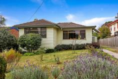 15 Station Street Katoomba NSW 2780 $495,000 to $525,000 Situated in a popular and picturesque tree-lined street, nestled amongst character homes, this property is as convenient as it gets. Just 300m (approx.) to train and a short walk into town. Approx.1.3km to North Katoomba Public School. This delightful home has the ease of single level living, centred in a well maintained garden dotted with pretty shrubs and citrus. Accommodation is 3 bedrooms with the third being perfect for a nursery or office. Living and dining are combined, plus a lovely sunroom with expansive easterly views over the neighbouring streets and beyond. The home features large picture windows creating lovely outlooks and light filled rooms within. Absolutely comfortable as is, yet a fantastic opportunity to renovate and recreate! Priced to sell, you don’t want to miss out on this one! Features; – Natural gas cooking, water and heating – Internal laundry – Single lock up garage – Close to transport – Rear lane access