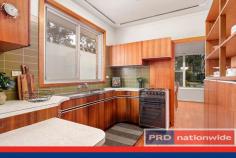 17 Old Forest Road Lugarno NSW 2210 $959,000 Rarely do you find the opportunity to buy large and level Lugarno land. Complimented by a much loved and cared for single level home, let your imagination run wild as you plan out your renovations or your new dream design (subject to council approval). Well equipped for the growing family offering four bedrooms and two living areas. The best part is the additional rooms out back, whether they be used as a studio, home office, teenage retreat or maybe a workshop for a tradie and their materials. All of this conveniently placed across the road from Lugarno public school and bus stop. * Light filled bedrooms all with built-in robes * Stunning ensuite with heated mirror & towel rail * Timber floors, split cycle air-con, ceiling fans, solar electricity * New corrugated steel roof installed in 2016 * In-ground pool with external toilet & shower to wash down * Covered alfresco area great for entertaining * Exterior rooms - possible teenage retreat, office or home studio * Garage, carport and off-street parking for 2 more cars & a caravan * School and bus stop across the road * Short walk to local shops, cafe and park