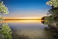 176 White Patch Esplanade, WHITE PATCH QLD 4507 | Madeleine Hicks Real Estate Brisbane There are only a limited number of waterfront properties and your acreage beach hideaway is hidden amongst the gum trees, only two doors from the Bribie Island Recreational Park. The environment is not only special but unique and here you will find your charming Polynesian Style home. Character, soaring ceilings, polished floors, wide deck a truly idyllic property located in a natural Australian bush environment with the sparkling sun kissed Pumicestone Passage at your front door. With 2023 square meters fully fenced lot, it is perfect for children and pets to enjoy. There is plenty of room for “toys” in the 3 huge sheds plus bonus plumbed-in shed with kitchen facilities. Life on the esplanade is tranquil with visits from the local kangaroo and wallaby families, occasional brumby and other local wildlife. It is a pleasure to sit on the deck and gaze over at the shimmering passage while only a few minutes’ drive to Banksia Beach Shopping Centre, Banksia Beach Primary School, Pacific Harbour Golf and Country Club, Solander Lake Bowls Club and much more. You will LOVE: – Potential for granny flat – 2 bedrooms plus office or nursery – Ensuite – Solar 3kw – Fire place – 4 car accommodation – Open plan living – Side access – Light filled living – Huge SHED Ask Madeleine and Kerry today to make this hidden gem yours before someone else does. Land: 2023 m² Bedrooms: 2 Bathrooms: 2