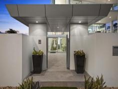 115 Margate Pde, Margate - Waterfront Properties Redcliffe ULTIMATE IN LUXURY LIVING This luxurious masterpiece will impress from start to finish. Boasting the perfect location, this architecturally designed and built home offers outstanding vistas and a waterfront lifestyle second to none. Properties of this calibre and location are rarely offered to the market. Move in and enjoy being surrounded by the absolute quality this immaculate residence offers…… not to mention waking to the sound of waves rolling gently onto the foreshore, sunrise peeping over the horizon and the moon shimmering across the bay at the close of play …….. just amazing. The user-friendly design features high ceilings and spacious light filled rooms with a floor plan that spans 3 levels of designer brilliance, this home ticks every box. Providing the ultimate in executive entertainment with a full wet bar and pool room flowing onto the extensive deck, where you will spend hours enjoying the endless views across the bay or alternatively, move to the sanctuary of the media room to choose from a full range of entertainment options. The huge feature packed gourmet kitchen leaves nothing to be desired. Including a massive island bench ideally positioned to take in the glorious bay views. Miele appliances including dishwasher, 900mm induction cook top, steam oven, plate warmer and microwave with an abundance of storage. The third level master bedroom epitomises luxury with extensive bay vista pouring into the room, massive open area ensuite and WIR. A further three double sized bedrooms, all with large WIRs, a second ensuite, main 2 way bathroom/ensuite and powder room provides for all the family and guests with ease. Massive 674sqm of luxuriously appointed living Additional Features: - Huge home office - The basement level has space for all the toys, including up to 8 car spaces with large storage room, second laundry and powder room. - Very Low maintenance, fully landscaped block with a 23,000 litre inground, concrete water tank. - Ducted air throughout - Polished timber staircases - Huge well appointed laundry - Vacuum maid - Intercom - Security alarm system - Water and power to all balconies - Efficient Heat pump hot water system - Provision, plans and approval for lift and pool. From this gorgeous home, stroll in either direction for kilometres without leaving the sandy shores of the bay. Perched on arguably the premium strip of beach on the Peninsula, this home is simply …….the ultimate in luxury waterfront living. Property Code: 590