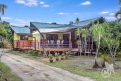 176 White Patch Esplanade, WHITE PATCH QLD 4507 | Madeleine Hicks Real Estate Brisbane There are only a limited number of waterfront properties and your acreage beach hideaway is hidden amongst the gum trees, only two doors from the Bribie Island Recreational Park. The environment is not only special but unique and here you will find your charming Polynesian Style home. Character, soaring ceilings, polished floors, wide deck a truly idyllic property located in a natural Australian bush environment with the sparkling sun kissed Pumicestone Passage at your front door. With 2023 square meters fully fenced lot, it is perfect for children and pets to enjoy. There is plenty of room for “toys” in the 3 huge sheds plus bonus plumbed-in shed with kitchen facilities. Life on the esplanade is tranquil with visits from the local kangaroo and wallaby families, occasional brumby and other local wildlife. It is a pleasure to sit on the deck and gaze over at the shimmering passage while only a few minutes’ drive to Banksia Beach Shopping Centre, Banksia Beach Primary School, Pacific Harbour Golf and Country Club, Solander Lake Bowls Club and much more. You will LOVE: – Potential for granny flat – 2 bedrooms plus office or nursery – Ensuite – Solar 3kw – Fire place – 4 car accommodation – Open plan living – Side access – Light filled living – Huge SHED Ask Madeleine and Kerry today to make this hidden gem yours before someone else does. Land: 2023 m² Bedrooms: 2 Bathrooms: 2