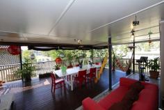 161 Ham Rd Mansfield QLD 4122 If you are looking for a large home with room for entertaining as well as caravan or boat and several cars this should be on your inspection list. Across the road from Mansfield High and Primary School Room for extended family with bedrooms up and down Extra utility rooms down Extra large deck across the front of the property Polished timber floors upstairs in lounge dining Large 6 Meter shed to the rear with high roofline and fully powered Large 23 solar panels to supply electricity to property Large outdoor deck across the rear Easy access to City bus local shopping and Brisbane airport