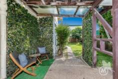 64 MacDonnell Rd, MARGATE QLD 4019 | Madeleine Hicks Real Estate Brisbane Shhhh, don’t tell anyone, it can be our secret just how great this is. This fantastic house is just 800mtrs to Suttons Beach and freshly renovated. But you’d better snap it up quick because properties in this price range this close to the beach don’t last long. This renovated home has room for a growing family, great entertaining spaces, a generous fully fenced yard with side trailer access, and all of the lifestyle and conveniences the peninsular has to offer. You will love the modern living spaces, garage workshop, teenage retreat, wrap-around entertaining area, and convenient location. The Fast Facts: – Recently renovated – Just 800mtrs walk to Suttons Beach – Wrap around entertaining area with built in BBQ – Teenage retreat with separate shower and toilet downstairs – Side access with room to secure the boys toys or caravan behind a locked gate – Workshop area attached to the garage – Nearly brand new appliances including quality oven and air conditioning – Generous and very usable fully fenced yard. The sellers have absolutely loved raising their family in this fantastic location, and so will you. With everything at your doorstep and the ocean just meters away, life will be great. Mike will get you Moved, enquire now!!! Land: 405 m² Bedrooms: 3 Bathrooms: 2