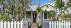 176 MANNING STREET KIAMA NSW 2533 $785,000 - $860,000 This wonderfully restored character cottage represents a slice of yesteryear, circ 1914, is centrally located and convenient to Kiama's stunning beaches, shops, cafes, station and schools. It enjoys many original features including wide timber floorboards, high ceilings and an ornate fireplace. Both kitchen and bathroom have been beautifully redesigned to allow the enjoyment of modern convenience whilst retaining its original elegance. With guest sleepout, lovely rear deck and landscaped gardens a viewing will more than delight. - Living room with a fireplace overlooking beautiful gardens - Three bedrooms and a sleepout currently used as a B and B - Generous backyard, landscaped for privacy - Modern eat in kitchen, renovated bathroom with free standing bath - Large timber deck for entertaining - Central location convenient to the beach, schools and shops - Side driveway access to the backyard