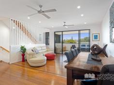 9 / 32 John Street, Redcliffe - Waterfront Properties Redcliffe Superb Townhouse living! If you want the space of a house but not the yard work, then you need to consider this trendy near-new three-level townhouse. Located within walking distance of all of Redcliffe’s conveniences and the waterfront at Sutton’s Beach, you’ll love the position. This townhouse is facing quiet Ella Street, so you’ll enjoy quite a peaceful, handy location. It’s generous 251m2 of space is spread over three levels, starting with a DLUG at the ground level, plenty of storage and one of the en-suited bedrooms, making it perfect for a guest room or teenage retreat. On the middle level, you’ll enjoy a spacious open plan with the kitchen, dining, powder room, laundry and indoor/outdoor living zones. The living area opens onto a good-sized private balcony where you can relax with friends and enjoy a nice bay breeze here… The kitchen is spacious, practical, on trend and has plenty of storage making it a desirable place to whip up a treat whilst still interacting with family or guests. Up on the third level, you’ll find three good-sized bedrooms, including the en-suited Master bedroom and the main bathroom. This secure townhouse has its own terrace and lawn area, so will suit those still wanting a low-maintenance garden to potter in. Features: * Four good-sized bedrooms * Double lock-up garage with internal access * Two bedrooms are en-suited * Tons of convenient storage throughout * Three bathrooms + powder room * Convenient, quiet location * Low Body Corp fees * Presents like new - save $$$ on the 'new' price As the current vendor is relocating due to a change of work circumstances, he is keen to move on so pop this one on your list to inspect. Call Karen Prince on 0437 015 951 to arrange a time…
