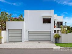 1 Landsborough Avenue, Scarborough - Waterfront Properties Redcliffe Sleek and Stylish Family Home This modern stylish family home on a 405m2 block has been masterfully designed to make use of all available space. Feature packed this quality built home is supremely appointed and boasts the following: Expansive parents retreat with WIR, luxurious ensuite complete with twin shower, his and hers vanities and double spa bath, private balcony with water views 3 additional bedrooms with BIR 2 Living areas Media room Gourmet kitchen with servery to alfresco area + 6 burner gas stove, walk in pantry Ultra modern main bathroom, ensuite, powder room Good size laundry Double lock-up garage + additional oversize garage perfect for the caravan or boat, enough room for all the toys Relax in the resort style Magnesium pool with spa and waterfall features Fantastic outdoor area for entertaining Beautiful established gardens Fully fenced with intercom at the gate Solar power Ceiling fans throughout Walking distance to Scarborough Village and Southern Cross & Tech Colleges. No expense was spared when this impressive home was built. With too many features to possibly list, this is a must to inspect. Call Mark on 0413 447 576 to arrange an immediate inspection!