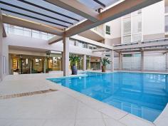 16 / 146 Prince Edward Parade, Scarborough - Waterfront Properties Redcliffe Right on the Bay! There are just so many features to enjoy if you move into 'The Bay' complex at Scarborough - which is described by residents as a "Happy building". Not only is Unit 16 a very spacious (199m2) three bedroom apartment, but its design is practical and well thought out. With views that cannot be built out you will always be able to enjoy the gorgeous Bay outlook plus the delightful pretty night lights of both Redcliffe and all the way back to the Port of Brisbane. It's important for buyers to know that any new home built on the visible vacant block has a height restriction - the same level as the ones either side, so you will always have a water view. The very large Master bedroom opens up to the balcony facing the Queens Beach, so you can fall to sleep listening to the water lapping at the foreshore. Both ensuite and spare bathroom are bigger than most and the apartment has tons of storage cupboards throughout. Superbly located approximately halfway between Redcliffe and Scarborough, you can walk out the door and decide which way you fancy wandering off for your morning walk! It's such a desirable lifestyle choice with happy residents who enjoy an living in an attractive, well-serviced building. The lovely foyer features a gorgeous pool, spa, gym and large common area. Even the secure basement carpark is well-serviced, with a bathroom (ideal if you are downstairs in your garage area),a car wash station along with direct access to the beachfront via a tunnel walkway (meaning you can wheel a kayak or bikes from your garage through to the waterfront). Fully enclosed double garages are rare in unit complexes and this one is certainly bigger than average with plenty of storage room - perfect for those down-sizing from larger family homes who still want somewhere to 'potter or tinker'. As there is no road in front of this unit, there is minimal (if any) traffic noise either! This lovely apartment is well worth an inspection, so it should definitely be on your list of apartments to view! This unit features: • Spacious 199m2 of living • Three good-sized bedrooms • Study nook • Large bathrooms • Separate laundry • Two separate balconies • Water views from your kitchen, living area and front balcony • Plantation shutters throughout • Freshly re-painted internally • Access to pool, spa, gym roof-top • Great location with direct access to walking paths and the beach • Large double lock-up garage in secure basement carpark • NBN ready You need to make an appointment to view this apartment to appreciate all of the above, so call Karen Prince now on 0437 015 951 to arrange a time!