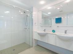 16 / 146 Prince Edward Parade, Scarborough - Waterfront Properties Redcliffe Right on the Bay! There are just so many features to enjoy if you move into 'The Bay' complex at Scarborough - which is described by residents as a "Happy building". Not only is Unit 16 a very spacious (199m2) three bedroom apartment, but its design is practical and well thought out. With views that cannot be built out you will always be able to enjoy the gorgeous Bay outlook plus the delightful pretty night lights of both Redcliffe and all the way back to the Port of Brisbane. It's important for buyers to know that any new home built on the visible vacant block has a height restriction - the same level as the ones either side, so you will always have a water view. The very large Master bedroom opens up to the balcony facing the Queens Beach, so you can fall to sleep listening to the water lapping at the foreshore. Both ensuite and spare bathroom are bigger than most and the apartment has tons of storage cupboards throughout. Superbly located approximately halfway between Redcliffe and Scarborough, you can walk out the door and decide which way you fancy wandering off for your morning walk! It's such a desirable lifestyle choice with happy residents who enjoy an living in an attractive, well-serviced building. The lovely foyer features a gorgeous pool, spa, gym and large common area. Even the secure basement carpark is well-serviced, with a bathroom (ideal if you are downstairs in your garage area),a car wash station along with direct access to the beachfront via a tunnel walkway (meaning you can wheel a kayak or bikes from your garage through to the waterfront). Fully enclosed double garages are rare in unit complexes and this one is certainly bigger than average with plenty of storage room - perfect for those down-sizing from larger family homes who still want somewhere to 'potter or tinker'. As there is no road in front of this unit, there is minimal (if any) traffic noise either! This lovely apartment is well worth an inspection, so it should definitely be on your list of apartments to view! This unit features: • Spacious 199m2 of living • Three good-sized bedrooms • Study nook • Large bathrooms • Separate laundry • Two separate balconies • Water views from your kitchen, living area and front balcony • Plantation shutters throughout • Freshly re-painted internally • Access to pool, spa, gym roof-top • Great location with direct access to walking paths and the beach • Large double lock-up garage in secure basement carpark • NBN ready You need to make an appointment to view this apartment to appreciate all of the above, so call Karen Prince now on 0437 015 951 to arrange a time!