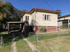 8 Millen St Churchill QLD 4305 Sitting on a huge 1439sqm block this 2 bedroom post war that has had a makeover on the inside, but needing some work on the outside. There may be the possibility of subdivision or units (subject to Council approvals) Whilst this is currently a 2 bedroom house, it can easily turn into a 3 bedroom with a small adjustment to the entry to the front sunroom. The kitchen and bathroom were re-modelled a couple of years ago and the dishwasher and stove are reasonably new. There is a large covered deck off the kitchen. The 2 bedrooms are a good size and the main has a wardrobe. This property is for someone to live in and do the renovation and enjoy a large yard with potential down the track or a renovator looking at a turnaround. The property has previously been rented at $260 per week. This information has been provided to us by third parties and we do not accept any responsibility for its accuracy. You should make your own enquiries and check the information so as to determine whether or not this information is in fact accurate. You must make your own assessment and obtain professional advice if necessary.