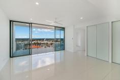 904/9-11 'Bay Grand Apartments' Enid Street Tweed Heads NSW 2485 $650K - $690K From the moment you open the door of your brand new apartment, you will be spell bound by the majestic 180 degree views of the Tweed River, Seaway & the Pacific Ocean, including Cook Island. This sleek & crisp (2) bedroom apartment is located on the top floor (9th level) and offers secure & comfortable living with a myriad of lifestyle conveniences at your finger-tips. KEY FEATURES: - Open plan tiled living & dining - Stylish kitchen w dishwasher & gas cooktop - Master bedroom w ensuite & balcony access / amazing sea views - Generous terrace style balcony to relax & enjoy the views - Secure basement parking - Pet friendly ADDITIONAL FEATURES: - Ducted air-conditioning - Ceiling fans - Resort style lap pool & gym facilities - BBQ facilities DETAILS: Body Corporate - $70 approx. per week Rates - $TBA Market Rent - $525-$550 per week Holiday Market weekly tariffs - (please refer to www.goldcoastholidayhomes.com.au for letting & management advice) LOCATION: This brand new apartment is extremely well positioned on the cusp of Coolangatta CBD & Tweed central. Therefore, you can leave your car at home and stroll to a smorgasbord of cafes, with major shopping at the end of the street. In addition, you are walking distance to the Tweed Hospital, Bowls Club and local beaches at Coolangatta & Rainbow, which are so close you can smell the salt in the air! AGENT'S COMMENTS: A brand new abode, super convenient and ready to welcome its first resident, lucky you! Nothing to do but move in and enjoy, it's quite possible you will never want to leave'.