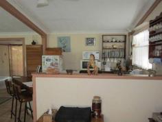 10 Kellaway Street Westwood QLD 4702 $225,000 Considered moving out of town to raise a family while only 40 minute drive to Rockhampton TRY Westwood. Look at what Kellaway Street offers- – Neat and tidy 3 bedroom. – Large open plan living kitchen / dining area. – Air-conditioned. – Above ground pool. – Shed/work shop. – 3 Green houses. – Solar panels in place. . Good bore. . Rain water tanks. . Fire place. – 1.25Ha (3 acres) approx. – Rear patio. Call Vince or Carlee to arrange inspection.