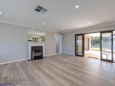 15 Wortley Road Greenmount WA 6056 $549,000 A 2018-built home surrounded by established gardens and landscaping puts you ahead of the game, ensuring you are ready to start your new life without having to bother about all of the usual ‘to-dos’ that come with a new build. This 4 bedroom, 2 bathroom Greenmount home delivers a chic, modern colour scheme, good sized bedrooms, an expansive parents’ retreat and a flexible floorplan. A below-ground pool, fully-fenced backyard and sizeable outdoor entertaining zone add the finishing touches to this stylish family home with a convenient foothills location. 4 Bedrooms 2 bathrooms 2018 rebuilt brick & iron Central open plan living Modern kitchen/meals Separate bedroom wings Spacious parents’ retreat Crisp chic colour scheme Poolside entertaining area Elevated 819 sqm block Foothills conv with views Set on the high side of the street with views of the Helena Valley this 4 bedroom, 2 bathroom home was rebuilt in 2018. A fresh, modern aesthetic, flexible floor plan and established gardens and landscaping combine to fashion a stylish home ready and waiting to begin life with a new family. A long verandah edged with lawn and garden draws you to the front door and into the open-plan kitchen/meals/family. Large picture windows make the most of the elevated position and valley outlook. A limited colour palette and easy-care finishes create a welcoming space that is both modern and practical. The kitchen features new appliances – a 900 mm oven, 5-burner hob and rangehood. Marble-look tops and white cabinetry with brass-look handles bring a cohesive style to the central island and benchtops. In the family room, a gas log fireplace creates a cosy focus while double doors open to the covered entertaining area and below ground pool – delivering seamless indoor-outdoor living. A gas bayonet and ducted evaporative cooling ensure year-round comfort. Double French doors lead from the family room to the spacious adults’ suite occupying one end of the home. A large bedroom with ample storage opens to a spacious lounge room and ensuite. Doors from the lounge area lead to the outdoor entertaining area, an arrangement that expands the indoor-outdoor living on offer. A central hallway with a timber dado leads to the 3-bedroom junior wing, family bathroom and laundry. New carpets Two of the junior rooms are fitted with mirrored built-in robes while a third has a walk-in robe, all boast new carpet. The neutral, limited colour scheme continues in the fully tiled family bathroom. The fully fenced backyard features a series of terraced lawn and garden centred around the below-ground salt pool. A gazebo and sizeable covered patio offer ample space for entertaining and relaxation. This home is turn-key ready with established gardens and landscaping, giving you the freedom to start enjoying your new home the moment you move in. Within easy reach of the local primary school, arterial road links and the outdoor adventures of the John Forrest National Park, this foothills property is ready and waiting.