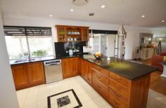 3119 Beechmont Rd Witheren QLD 4275 $989,000 This is a rare opportunity to acquire three homes for the price of one, a Five Acre "Boutique Equestrian" property that is divided into four good sized paddocks backing onto the "Coomera River" with amazing views of the surrounding Ranges, Located just 5 minutes from the popular Country Town of Canungra which is a comfortable 15minute drive to Nerang and the Pacific Hwy. The Main Residence has four bedrooms three with built in robes, the master with a walk-in, with ensuite with a separate main bathroom and laundry, an open plan lounge, Rumpus and separate formal dining room, Kitchen with country styled timber cupboards and granite work tops, stainless steel appliances with gas cooktop and fan forced oven dishwasher etc, a wood burning fire place, ducted air conditioning and ceiling fans throughout. There is a large salt chlorinated in-ground pool and a Carport with parking for three cars plus a large covered parking area for a Boat & Caravan, with a separate workshop or office, with a separate 5kw back to the grid Solar System plus hot water system. The separate one bedroom Granny Flat has had a complete makeover is fully self contained with a split system A/C plus ceiling fans and could be used for Air B&B with a huge demand in this location. The Cottage is large and comfortable with a timber deck and inviting rural views, one bedroom with built in robes, a split system air-conditioning & Ceiling fans, a compact kitchen and modern bathroom. This fully fenced property includes a netted orchid of fruit trees and an established veggie patch, plus a fully enclosed set of dog kennels with runs and finally, a fully covered and enclosed area for the "Chooks" As you walk around the property you will be aware of the well manicured gardens that the current owners have loved and cared for over the years! The current owners have to down size and move on. For Inspections of this property please call John on 0412 571 900. Airconditioning, Broadband, Built In Robes, Courtyard, Deck, Dishwasher, Ducted Cooling, Ducted Heating, Ensuite, Fully Fenced, Grey Water System, In Ground Pool, Open Fireplace, Open Spaces, Outdoor Entertaining, Pay TV, Rumpus Room, Secure Parking, Shed, Solar Hot Water, Solar Panels, Split System AirCon, Split System Heating, Water Tank, Workshop,